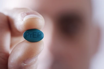 A close up someone showing a PrEP Rx