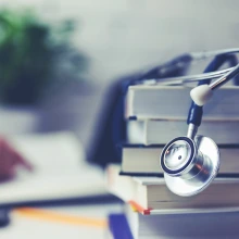 Stack of medical college books